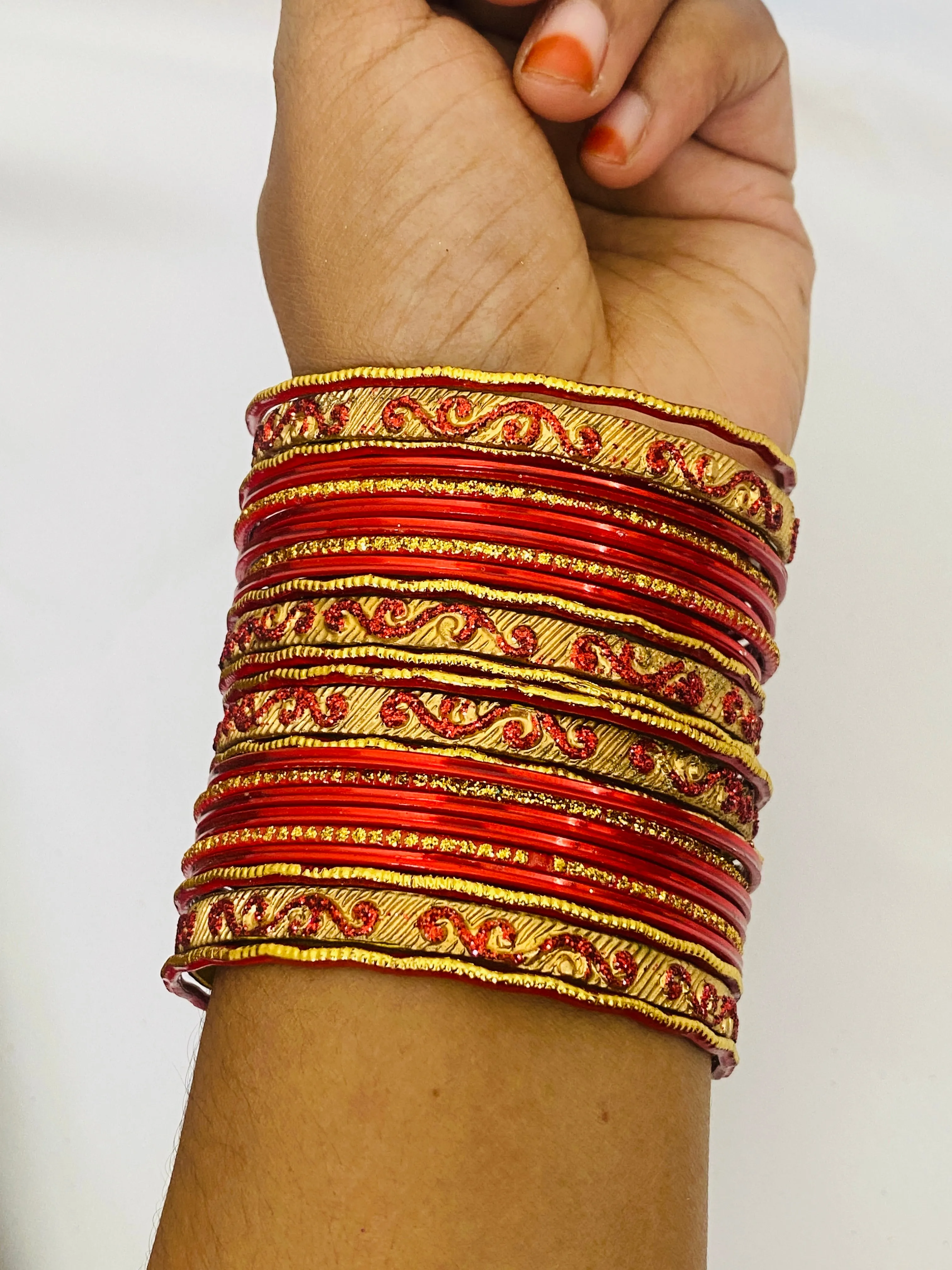 Red Color Exquisite Shinning Metal Bangles With Golden Work