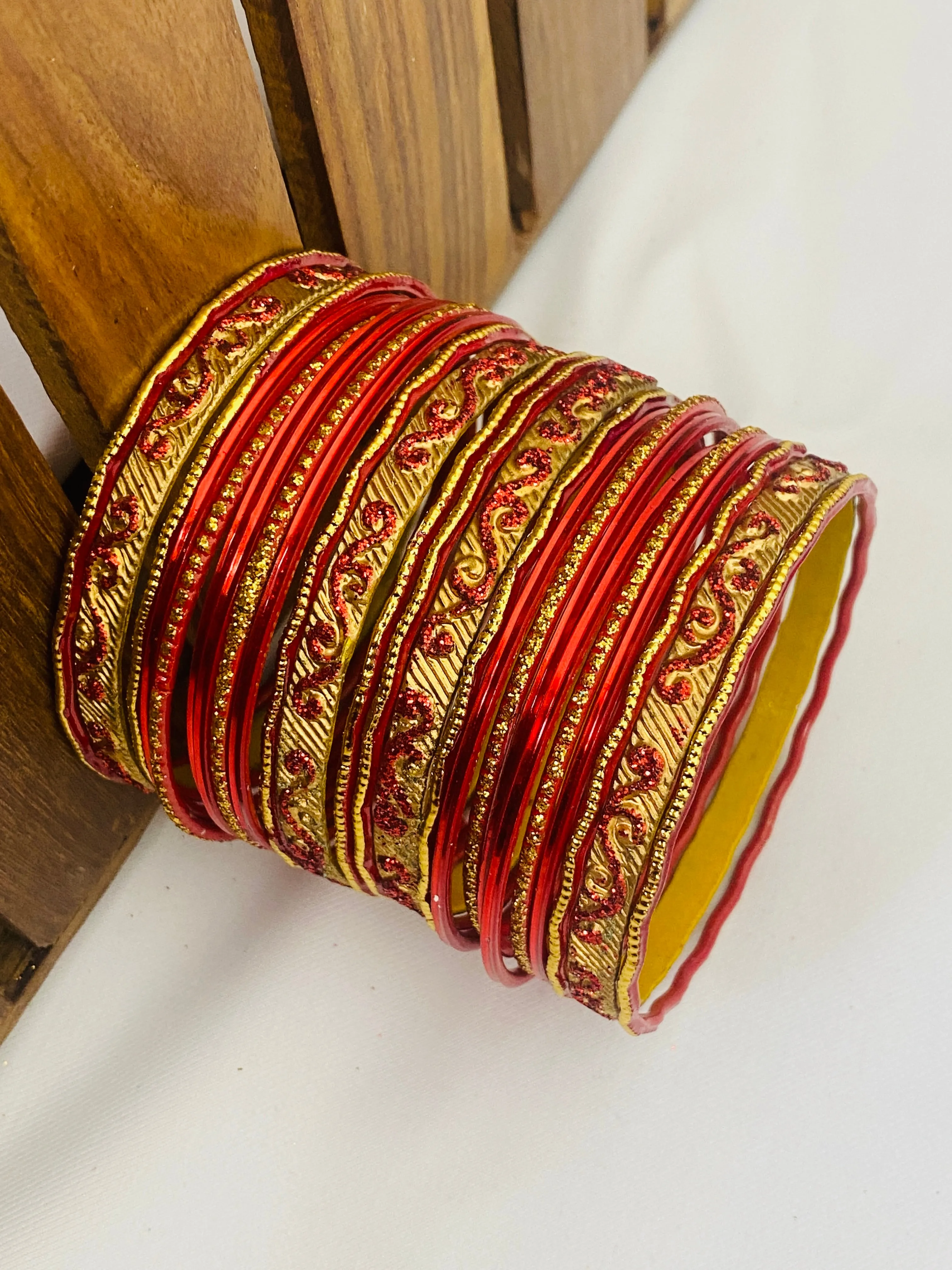 Red Color Exquisite Shinning Metal Bangles With Golden Work